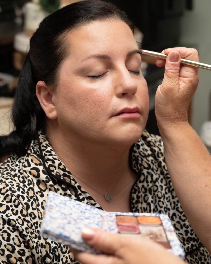 Bride getting ready putting on makeup, Smyrna, DE